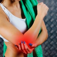 Tennis Elbow: Understanding the Condition & Healing Your Pain with Class 4 Laser Therapy